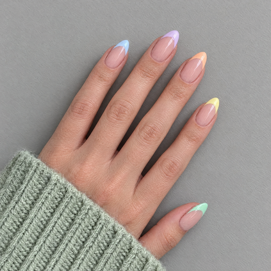 Colour Theory (Oval) press-on nails in an overhead flat lay matching the product style and original sleeve