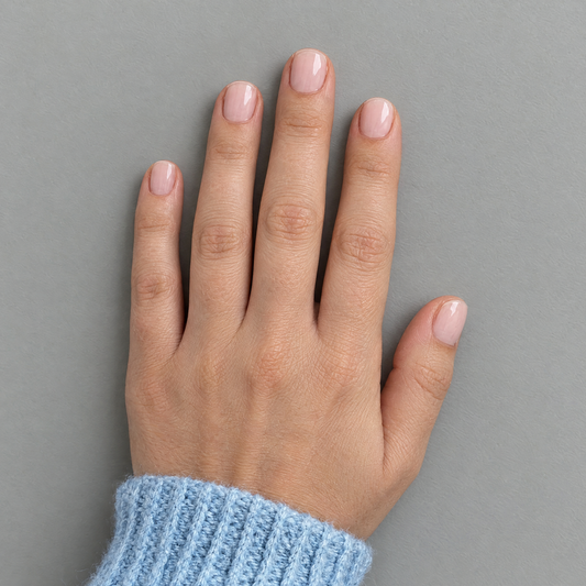 Barely There (Extra-Short) press-on nails shown in an overhead flat lay with the matching model and sleeve