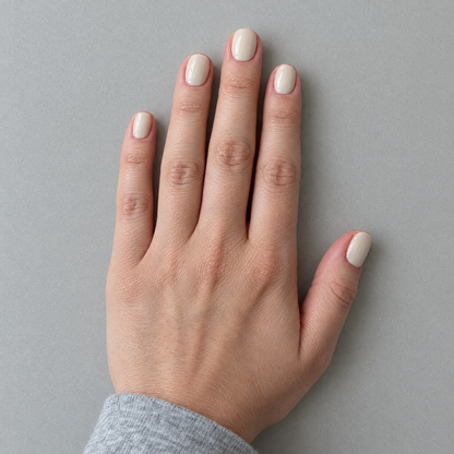 Cashmere (Extra-Short) press-on nails in an overhead flat lay matching the original model and sleeve
