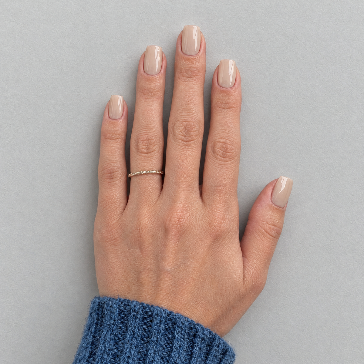 Latte (Square) press-on nails in an overhead flat lay matching the original model and sleeve