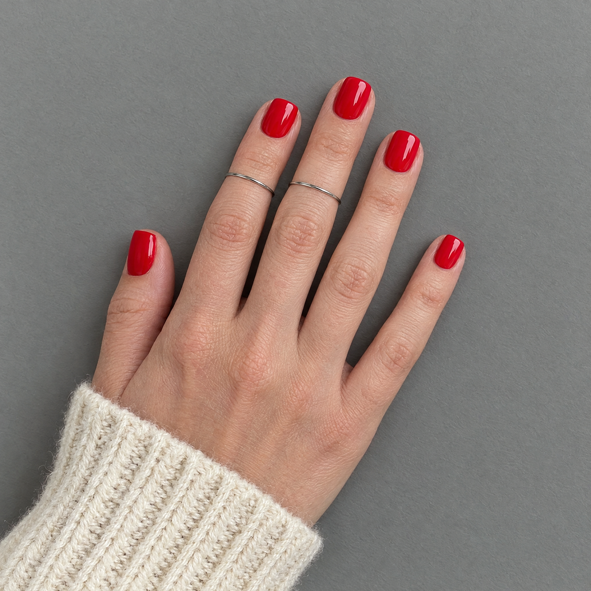 Red Letter (Extra-Short) press-on nails in an overhead flat lay matching the product style and original sleeve