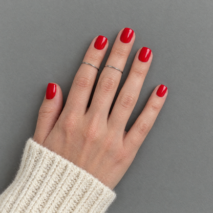Red Letter (Extra-Short) press-on nails in an overhead flat lay matching the product style and original sleeve
