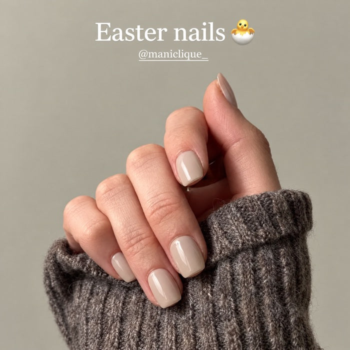 Neutral manicure with knit sleeve